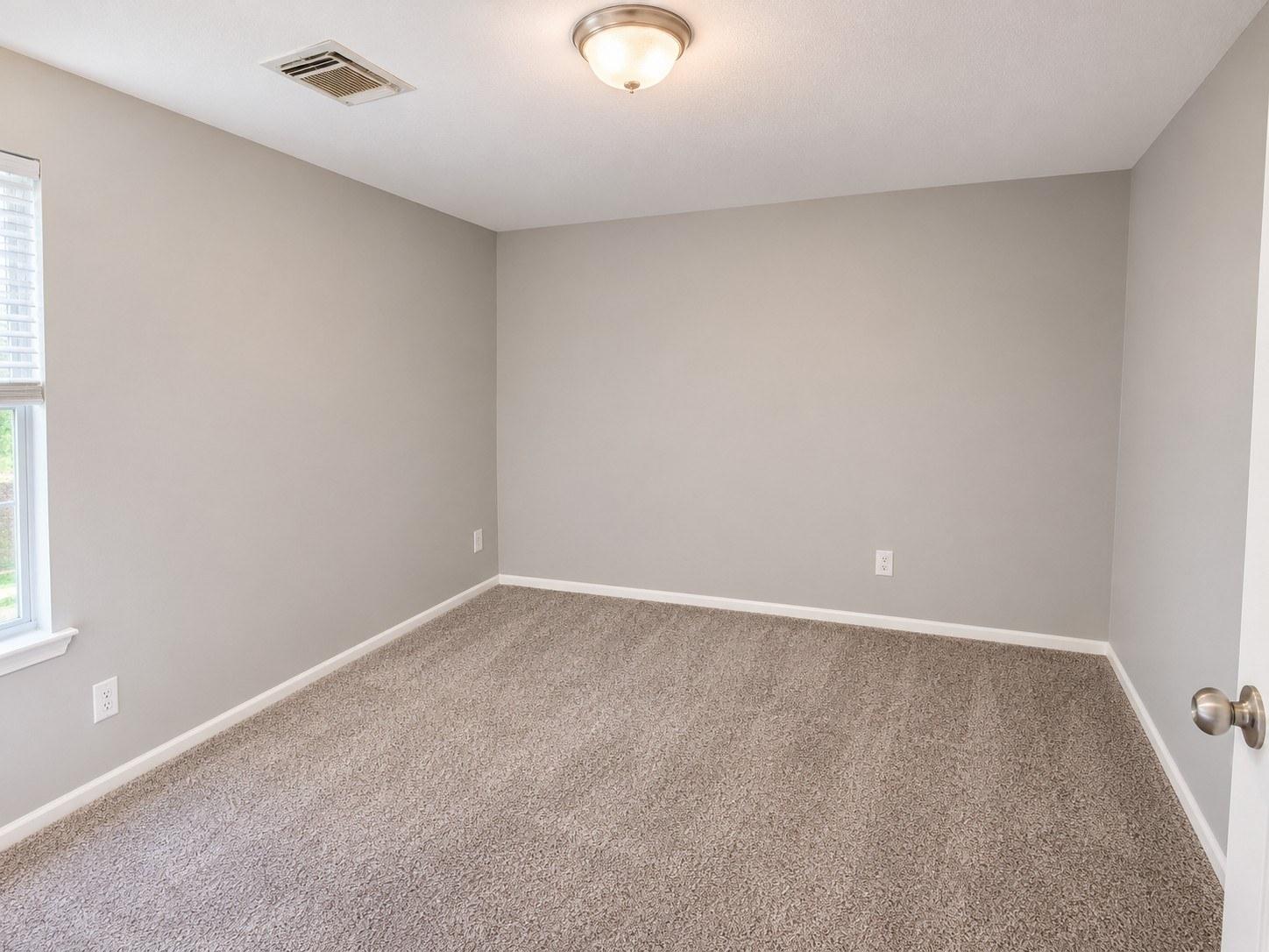 Empty_Neutral_Bedroom_In.jpg